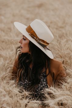 The stylish wide brim Atacama brings a modern appeal to a classic style. The oversized feathers on the hat are just one of its unique features. 4" Flat Brim and 5" Teardrop Crown All Natural Shantung Straw Firm Finish Made in the USA Female Dreads, Fedora Fashion, Nfr Style, Authentic Turquoise Jewelry, Graduation Pics, Stetson Hat, Cowgirl Hats, Graduation Pictures, Unique Features