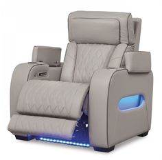 the reclining chair has blue lights on it's arm and footrests