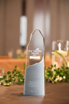 an award is placed on top of a table