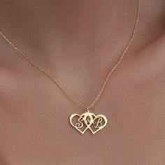 "Personalized  Heart Letter Necklace is made by hand in our workshop with care. All our jewelry is the most elegant choice for the Bridesmaids, friends, your loved ones and for yourself. Personalized  Heart Letter Necklace * Material: High Quality Solid 925 Sterling Silver. * Finish: Sterling Silver ∙ Gold ∙ Rose Gold. HOW TO ORDER ❓ * Select your necklace COLOR. * Choose necklace length from 14\" to 22\". The length option is the TOTAL chain length (including the charm). If you order an 18\" chain, the piece will come as CHAIN + CHARM = 18\".  * Simply you can upload photo via message on Etsy. * Finish your payment and complete your order. PRODUCTION TIME 🕒 All items made to order. Production starts within 12 hours and ships within 24 hours. P A C K A G I N G 📦  All of our jewelry arriv Handmade Double Heart Jewelry For Anniversary, Handmade Double Heart Necklaces For Anniversary, Handmade Open Heart Necklace For Anniversary Gift, Double Heart Initials Necklaces For Anniversary Gift, Heart Beads Jewelry For Anniversary Gift, Initials Double Heart Jewelry For Anniversary, Double Heart Initials Jewelry For Anniversary, Double Heart Initials Necklace For Valentine's Day, Double Heart Initials Jewelry For Anniversary Gift