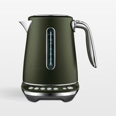 an image of a green toaster on a white background