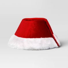 a red santa hat with white fur on top