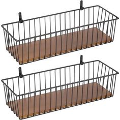 two metal baskets with wooden shelves on each side, one is black and the other is brown