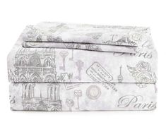 two sheets that are sitting next to each other on a white surface with the words paris written