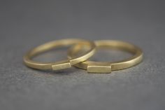 "GOLD LINE Measures/Details - ONE Solid 14k yellow gold / rose gold / white gold. - 1.5mm or 2mm thick ring. The price is for a single ring. - Please write me your ring size at checkout. - Matte or high polished finish to your choice. Matte finish is photographed. - Packed in an elegant labeled ring box. - Size: This ring is available in US2 - US12. Larger ring sizes are possible please contact me for details. US ring size scale. I do not give refunds for incorrect size- it is the costumer's res Simple Yellow Gold Rings For Formal Occasions, Modern Yellow Gold Stackable Rings In Recycled Gold, Simple Yellow Gold Stackable Rings For Formal Occasions, Minimalist Yellow Gold Bands With Ring Detail, Minimalist 14k Gold Couple Rings For Formal Occasions, Modern Yellow Gold Couple Promise Rings, Modern Yellow Gold Couple Rings With Ring Detail, Modern Yellow Gold Rings With Simple Design, Modern Gold Bands As A Gift