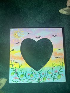 a painting with a heart on it and birds in the sky, painted by someone using acrylic paint