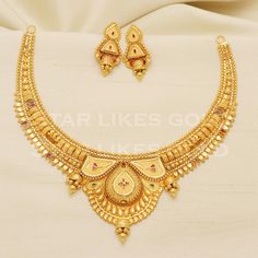 Adorn yourself with this elegant gold necklace, featuring a delicate chain and a stunning, handcrafted pendant. Its versatile design makes it a perfect accessory for both casual and formal looks, adding a subtle touch of glamour to your ensemble. 22kt yellow gold handmade necklace jewelry from Rajasthan India. Brand- StarLikesGoldIndia Weight- 26.63 grams approx. Metal- yellow gold real gold. Metal purity- 22 Karat. Max Length - Necklace 4 inches approx. Earrings - 3 centimeter approx Max Width- Gold Necklaces With Elegant Design For Anniversary, Gold Necklace With Elegant Design For Festive Occasions, Gold Chain Necklace With Simple Design For Gift, Gold Necklaces With Elegant Pendant Design, 22k Gold Chain Necklace For Wedding, Gold Bridal Necklace With Pendant And Elegant Design, Elegant Gold-plated Gold Necklace, Gold Plated Necklaces With Elegant Design For Celebrations, Gold Temple Jewelry Necklaces As Gift