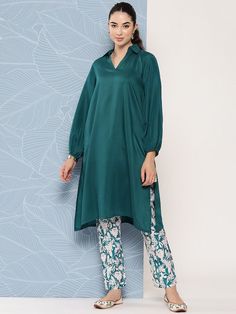 Teal solid Kurta with TrousersKurta design:Floral solidStraight shapeRegular styleShirt collar, three-quarter puffed sleevesCalf length with straight hemCotton blend machine weave fabricTrousers design:Printed TrousersPartially elasticated waistbandSlip-on closure Semi-stitched Long Sleeve Kurta With Printed Border, Long Sleeve Semi-stitched Organza Kurta, Blue Kurta With Stand Collar, Printed Trousers, Ethnic Dress, Thread Work, Kurta Designs, Shirt Collar, Three Quarter