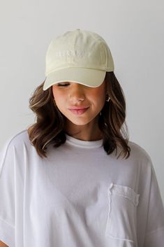 Calling all Savannah residents, the Yellow Savannah Embroidered Hat was made just for you! This cute hat is made of a soft cotton construction. It has a rounded top and a slightly rounded brim with "Savannah" embroidered on the front! Adjustable Strap Embroidered 100% Cotton Spot Clean with Damp Cloth or Sponge One Size Fits Most Adjustable Cream Hat With Embroidered Logo, Solid Color Hat With Embroidered Logo And Curved Visor, Casual Cream Cotton Trucker Hat, Everyday Cream Cotton Hat, Cream Cotton Bucket Hat, One Size, Cream Cotton Bucket Hat, One Size Fits Most, Cotton Hats With Curved Brim, One Size Fits Most, Cream Cotton Cap, Cream Cotton Baseball Cap With Embroidered Logo