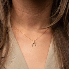 We're so happy to now carry our signature Horse Shoe charm necklace! Its simple look will compliment any outfit and looks perfect layering with other necklaces. It's such a great addition as an every day necklace! Handmade in Los Angeles. Worn everywhere. Material: 14k Gold Filled Horse Shoe Necklace, Horseshoe Necklace Gold, Every Day Necklace, Horseshoe Necklace, Gold Horse, Simple Look, Horse Necklace, Horse Shoe, Girly Jewelry