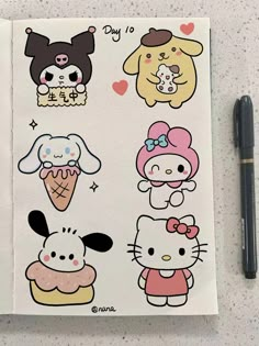 an open notebook with hello kitty stickers on it and a pen next to it