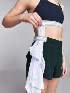 Spun from a single layer of lightweight fabric, our FLY RUN shorts offer up full coverage without weighing you down with unnecessary bulk. Quick-drying, moisture-wicking technology means you can work out without worrying about sweat patches, while the four-way stretch and crossover hem leaves you feeling unrestricted whether you’re lunging or lifting weights. Feeling the heat? Hook your tee or sweat towel into the elastic side strap to keep things hands-free. If you are in between sizes, we reco Running Wear Women, Sweat Towel, Ropa Upcycling, Run Shorts, Running Wear, Beauty Boost, Running Short, Lifting Weights, Training Shorts