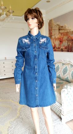 "embroidered jean dress Denim dress womens dress Floral embroidery dress Denim dress casual dress button dress BLUE dress L height of the woman in the photo - 180 cm Please refer to photos for details of condition. Condition: very good vintage Measurements: Length: 92 cm/36.2\" Bust: 96 cm/37.8\" Waist 86 cm/33.9\" Hips: 102 cm/40.2\" TAG SIZE US 10 UK 14 EUR 42 l note The color on the pictures may vary due to monitor settings and light reflections. Ready to ship Please do not hesitate to contac Casual Embroidered Denim Dress, Casual Embroidered Medium Wash Denim Dress, Embroidered Long Sleeve Denim Dress For Spring, Embroidered Denim Blue Long Sleeve Dress, Long Sleeve Embroidered Denim Dress For Spring, Embroidered Long Sleeve Denim Blue Dress, Long Sleeve Embroidered Denim Blue Dress, Embroidered Denim Blue Dress, Casual Embroidered Fitted Denim Dress