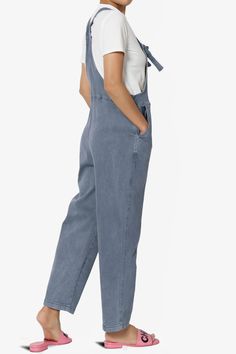 Embrace everyday chic with these denim overalls that blend utility and style. Their adjustable straps and relaxed fit ensure all-day comfort, perfect for casual outings.Made with a soft cotton blend and durable twill, these versatile one-piece jumpsuits are a wardrobe staple for any season.The cropped tapered legs and bib pocket add a contemporary touch to the timeless design, while slant pockets merge convenience with streetwear vibes.Ideal for casual travel, weekend wear, or special occasions, Spring Denim Blue Overalls With Side Pockets, Spring Cotton Denim Jumpsuit With Adjustable Straps, Casual Cotton Shortalls With Straight Leg, Spring Casual Denim Jumpsuit With Adjustable Straps, Relaxed Fit Overalls With Adjustable Straps For Spring, Casual Dark Wash Shortalls For Work, Spring Overalls With Adjustable Straps In Relaxed Fit, Spring Overalls With Adjustable Straps And Relaxed Fit, Casual Denim Jumpsuit With Adjustable Straps For Spring