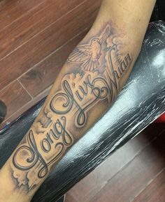 a person with a tattoo on their leg that says, love you always and an eagle