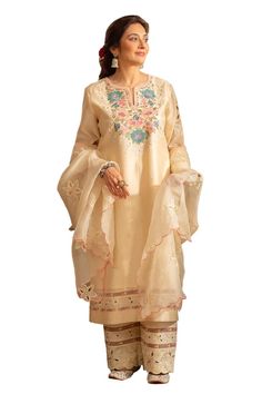 Almond ivory straight kurta featuring cutwork, floral embroidery on the front and hem. Paired with a embroidered pant and a scallop hem dupatta. - Aza Fashions Elegant Salwar Kameez With Cutwork For Festivals, Elegant Salwar Kameez With Cutwork For Festive Occasions, Elegant Festive Salwar Kameez With Cutwork, Elegant Cutwork Salwar Kameez For Festive Occasions, Elegant Unstitched Kurta With Cutwork, Unstitched Elegant Kurta With Cutwork, Unstitched Elegant Salwar Kameez With Cutwork, Elegant Beige Sets With Floral Embroidery, Elegant Unstitched Salwar Kameez With Cutwork