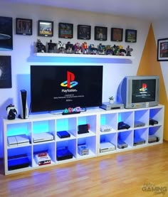 the entertainment center is decorated with video game memorabilia