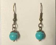 Turquoise Bead With Leaf Dangle Charms Within Small Hoop | Etsy Turquoise Dangle Hoop Earrings Nickel Free, Nickel-free Turquoise Dangle Hoop Earrings, Hypoallergenic Turquoise Beaded Dangle Earrings, Leaf Charms, Dangle Charms, Turquoise Beads, Minneapolis, Etsy Earrings, Dangle Drop Earrings