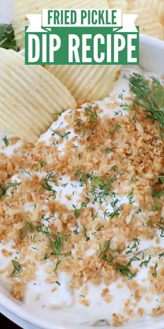 a white bowl filled with dip next to potato chips and a green sign that says fried pickle dip recipe