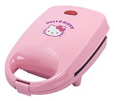 a pink hello kitty toilet paper dispenser on a white background with the words hello kitty written on it