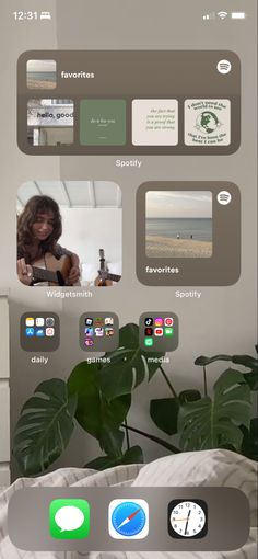 an iphone screen with the home screen showing various things on it, including plants and other items