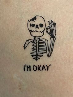 a drawing of a skeleton holding a plant with the words i'm okay written on it