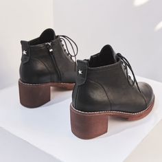 Pre-order: Ships out in about 2-3 weeks. PU leather lace up booties with a low shaft, short chunky heel and zip up side for easy wearing. Fits true to size. Please refer to Eur sizing or insole measurement for most accurate fit. 8cm / 3.15" shaft height 6cm / 2.36" heel height Fall Martin Boots With Zipper And Lace-up, Fall Lace-up Martin Boots With Zipper Closure, Trendy Lace-up Ankle Boots With Stacked Heel, Medium Width Lace-up Boots With Reinforced Heel, Casual Platform Ankle Boots With Stacked Heel, Casual Ankle Platform Boots With Stacked Heel, Lace-up Work Boots With Laces, Lace-up Workwear Boots, Lace-up Work Boots