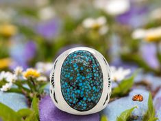 Embrace the artistry of the Southwest with this captivating Handmade Kingman Turquoise Ring (Size 9). Crafted by a skilled Arizona artisan, this unique piece features a genuine Kingman turquoise gemstone, renowned for its captivating blue hues and intricate matrix patterns.Handcrafted in Arizona: Each ring is meticulously crafted by a talented artisan, ensuring exceptional quality and a one-of-a-kind feel.Genuine Kingman Turquoise: The centerpiece of this ring is a stunning Kingman turquoise sto Kingman Turquoise, Southwestern Style, Turquoise Gemstone, Blue Hues, Sterling Silver Ring, Matrix, Turquoise Ring, Unique Pieces, Silver Ring