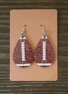 "-Lightweight sublimation earrings -Style: Teardrop -Material: Wood -Design is on both sides -Size: 1.57\"×1\" -Printed and shipped from my small business in Oklahoma ❤️" Personalized White Drop Earrings, Sublimation Earrings, Spirit Gear, Football Earrings, My Small Business, Wood Design, Material Wood, Oklahoma, Fashion Earrings