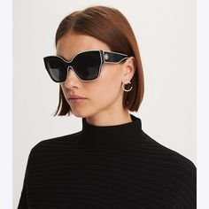 These oversized vintage-inspired frames are an updated take on a butterfly shape. The temples are detailed with our signature Double T logo. T Logo, Sunglasses Women Designer, Butterfly Sunglasses, Tory Burch Miller, Designer Accessories, Butterfly Shape, Colored Sunglasses, Designer Sunglasses, Eyewear Sunglasses