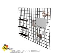 a black metal grid wall mounted to the side of a white wall with writing on it