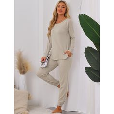 2-piece tracksuit set including a long-sleeve sweatshirt and jogger pants with pockets. The soft knit fabric offers comfort and luxury wear, making it perfect for both casual and loungewear outfits. This tracksuit set for women is fashionable, soft, stretchy, lightweight, breathable, and comfortable to wear at home. It also creates a casual look for outings such as shopping or going to a coffee shop. Additionally, it can be a perfect gift for your mom, wife, daughter, or girlfriend, serving as l Long Sleeve Tracksuit With Pockets For Loungewear, Solid Crew Neck Sets For Loungewear, Winter Tracksuit With Side Pockets For Loungewear, Relaxed Fit Sets For Fall Loungewear, Comfortable Long Sleeve Sweats For Relaxation, Casual Leisure Sets With Pockets, Casual Winter Loungewear Sets, Casual Loungewear Sets, Winter Casual Loungewear Set