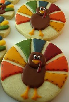 cookies decorated like turkeys on a table