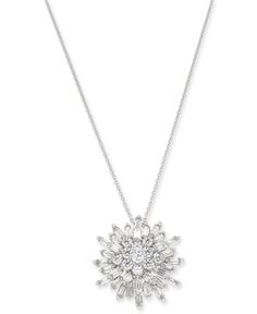 Shine brighter in this glamorous round-cut and baguette diamond starburst pendant necklace from Wrapped in Love. Dazzling White Baguette Diamond Necklace, Elegant Starburst Jewelry For Wedding, Elegant Starburst Necklace With Diamond Accents, Starburst Brilliant Cut Jewelry For Anniversary, Elegant Starburst Jewelry For Anniversary, Formal Starburst Diamond Jewelry, Elegant White Starburst Jewelry, Elegant Starburst Jewelry With Brilliant Cut, Elegant Starburst Brilliant Cut Jewelry