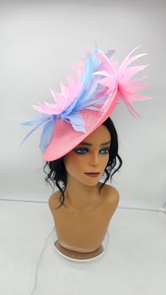 This stunning  piece is sure to turn heads with any outfit. Pink Fascinator with light blue accents on an adjustable headband for a secured. This will be a great way to add elegance to any,  bridesmaid,  rehearsal dinner,  Wedding guest,  cocktail party, or church outfit. - Ready to ship  - Lightweight - Fast shipping - Customize by adding different color flowers and or feathers Check my store for for styles and colors.  etsy.com/shop/hatsandpearls Find more at my website: Www.hatsandpearls.com  reach out to me if you can't find what you are looking for.  I can make cake custom orders and help you style and match your outfit Adjustable Light Blue Fascinator For Royal Ascot, Adjustable Light Blue Mini Hat For Kentucky Derby, Light Blue Adjustable Mini Hats For Kentucky Derby, Light Blue Headpiece For Royal Ascot Party, Adjustable Pink Carnival Hat, Light Blue Hat For Royal Ascot Races, Adjustable Pink Costume Hat For Carnival, Pink Adjustable Costume Hat For Carnival, Adjustable High Crown Blue Costume Hats And Headpieces