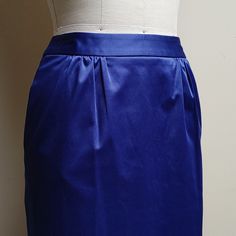 Talbots Petites Special Occasion Violet Satin Maxi Pencil Skirt W Pockets Labeled 2p, Modeled On A 4, See Measurements, Ask Questions. If This Is A True 2p, I Believe The Reason It Fits On Size 4 Dress Form Is Because It Was Designed To Be Worn Lower On The Hips Whereas, On The Dress Form, It Sits High On Waist. Nwt's From 2011, Suggest Dry Cleaning 1.5 Wide Waistband 13.5 Waist 17.5 Hips 36.5 Length 19 Back Kick Pleat Full Hand Deep Pockets, And This Suggests That Skirt Should Have Extra Room. Blue Fitted Satin Bottoms, Fitted Blue Satin Bottoms, Blue Satin Bottoms For Formal Occasions, Formal Blue Satin Bottoms, Elegant Purple Satin Bottoms, Blue Fitted Satin Skirt, Blue Pencil Skirt For Evening, Blue Pleated Skirt For Evening, Elegant Blue Relaxed Mini Skirt