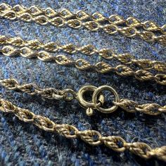 Antique 15ct gold chain 16.5 inches This antique 15 ct gold chain has knot links giving a textured and interesting look. The length is perfect for wearing with pendants, lockets etc and also for stacking with other pieces. The chain has a later 18ct bolt ring. The chain is yellow gold with an antique patina.  This interesting antique 15ct gold chain will make a wonderful birthday, Christmas or anniversary gift. ERA: circa 1900 APPROX. MEASUREMENTS: 16.5 inches,  chain width 2.5mm APPROX. GROSS W Victorian Gold Chain Link Necklace, Vintage Yellow Gold Rope Chain Necklace, Victorian Gold Link Necklace, Antique Link Style Gold Chain Necklace, Antique Yellow Gold Necklace With Wheat Chain, Antique Link Necklace With Gold Chain, Antique Gold Chain Link Necklace, Victorian Gold Chain Necklace With Oval Links, Antique Figaro Chain Necklace