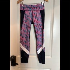 Athleta Nwot Navy Blue With Hot Pink, Grey And White Accents. The Pants Have A Zip Pocket On The Back Of The Waist Band. The Are Made Of 78% Polyester And 22% Lycra. Pink Casual Leggings For Training, Casual Pink Moisture-wicking Leggings, Pink Sportswear Leggings For Sports, Pink Athleisure Leggings For Running, Pink Athleisure Leggings For Sports, Sporty Pink Leggings, Multicolor Athleisure Bottoms For Sports, Casual Pink Yoga Pants For Sports, Pink Athletic Fit Activewear For Sporty Season