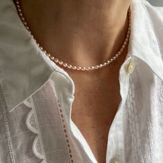 This delicate feminine necklace is made with high quality genuine AAA grade all natural 4x5mm rice shape pink freshwater pearls. These pink pearls have high luster and iridescence, with metallic light peach undertones. This stunning necklace features a minimalistic design worth for all occasions from casual to formal.  These rice pearls have a rich luster and are uniform in size.  The bracelet that matches the necklace is found HERE: https://www.etsy.com/listing/1433526548/small-pink-rice-pearl- Dainty Akoya Pearl Single Strand Necklace, Dainty Single Strand Akoya Pearl Necklace, Pearl Necklace With Tiny Round Beads, Pink Akoya Pearl Necklaces With Round Beads, Pink Akoya Pearl Round Bead Necklace, Pink Akoya Pearl Single Strand Necklace, Pink Single Strand Akoya Pearl Necklace, Pink Akoya Pearl Necklace With Round Beads, Feminine Pearl Beaded Necklaces