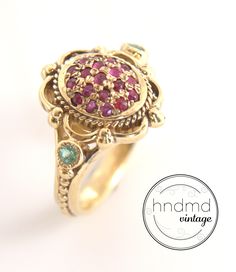 Very Unique Victorian HAND MADE 14K Gold Ring 19 RUBY + 2 EMERALD Measurement : Size: Custom / Adjustable WIDTH : 1.5 CENTIMETER WEIGHT : 5.7 GRAM Heirloom Ruby Ring In Yellow Gold, Antique Yellow Gold Ruby Ring, Antique Ruby Ring In Yellow Gold, Fine Jewelry Gold Ruby Cluster Ring, Heirloom Ruby Birthstone Ring, Gold Ruby Cluster Ring Fine Jewelry, Yellow Gold Ruby Halo Ring For Wedding, Gold Ruby Cluster Ring With Halo Setting, Yellow Gold Ruby Cluster Ring With Multi-stone