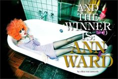 a woman laying in a bathtub with an orange wig