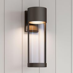 an outdoor wall light that is on the side of a white building with wood paneling