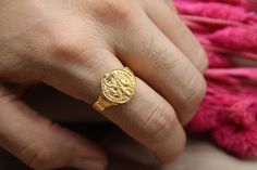 🏛️ Journey through History: Ancient Roman Coin 14K Unisex Ring 🏛️ Embrace the allure of the ancient world with this exquisite unisex ring. Crafted with an authentic ancient Roman coin and set in elegant 14K gold, this ring invites you to explore the rich stories of civilizations long past. ⚱️ Timeless Treasure: The genuine Roman coin at the heart of this ring carries the weight of centuries, connecting you to a time of emperors, myths, and the echoes of a bygone era. ✨ Unisex Elegance: Designed to be worn by all, this ring's elegance transcends gender. Its combination of ancient heritage and 14K gold craftsmanship speaks of a legacy that spans generations. 🎁 Thoughtful Gift: Give the gift of history and elegance to a loved one or yourself. This ring is more than just an accessory; it's Byzantine Style Signet Ring For Anniversary, 14k Gold Byzantine Ring Gift, 14k Gold Byzantine Style Gift Rings, 14k Gold Byzantine Ring As Gift, 14k Gold Byzantine Style Rings, 14k Gold Byzantine Round Ring, 14k Gold Byzantine Style Round Rings, Byzantine Yellow Gold Signet Ring For Anniversary, Yellow Gold Byzantine Signet Ring For Anniversary