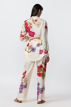 These ivory trousers are designed with an abstract digital floral placement print, featuring a relaxed vibe for the most flattering fit. They go perfectly with our matching Fleurel Silk Jacket. This item runs small, order one size up. Floral Print Jacket, Jacket Cape, Collared Jacket, High Waist Trousers, Placement Print, Silk Trousers, Indian Fabric, Ivory Silk, Printed Trousers