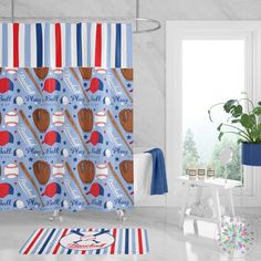 a baseball themed shower curtain in a bathroom