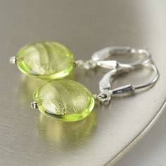 Chartreuse green murano glass earrings featured on sterling silver leverback earwires. The earrings have 14K white gold lining inside which is Murano Glass Earrings, January Birthstone Jewelry, Chartreuse Green, Garnet Red, Spring Earrings, January Birthstone, Earrings Green, Gold Line, Green Earrings