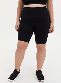 Matching style(s): Search 11031285 FIT Model is 5'10” wearing size 1. High-rise. 8” inseam. MATERIALS + CARE Performance Core knit fabric: Our signature fabric smooths, lifts and supports whether you're working out or hanging out. Stretch level: Maximum 4-way stretch so you can move without restrictions. Breathable to keep you cool. Maximum coverage and never see-through. Moisture wicking keeps you dry. Smoothing tech delivers light compression. 83% nylon, 17% spandex. Machine wash cold. Tumble Plus Size Yoga, Pocket Bike, Yoga Pants With Pockets, Black Bike, Cropped Joggers, High Waisted Swim, Fitted Joggers, Fitted Wedding Dress, Flare Mini Dress