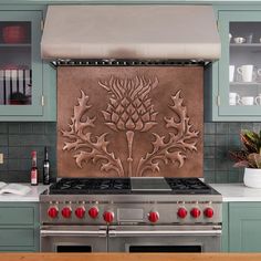 a stove top oven sitting inside of a kitchen next to a wall mounted range hood