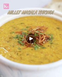 a white bowl filled with soup on top of a table