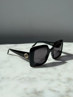 Brand new Gucci GG0896S 001 Black Square Sunglasses.Gold Gucci logos on temples.Dark grey lenses.Size 52-25-145.Comes with original case, cloth, and packaging.100% authentic.Retail price $435. Men's Eyeglasses, Samoa, Black Square, Seychelles, Equatorial Guinea, Dolce & Gabbana, Guinea Bissau, Mozambique, Ethiopia